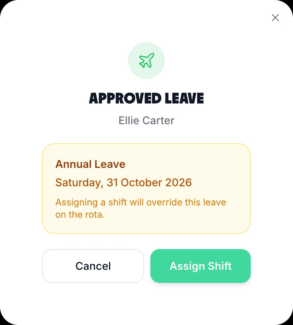 The Approved leave check in TimeTally: Ellie Carter, Annual Leave on Saturday 31 October 2026, Assigning a shift will override this leave on the rota, with Cancel and Assign Shift