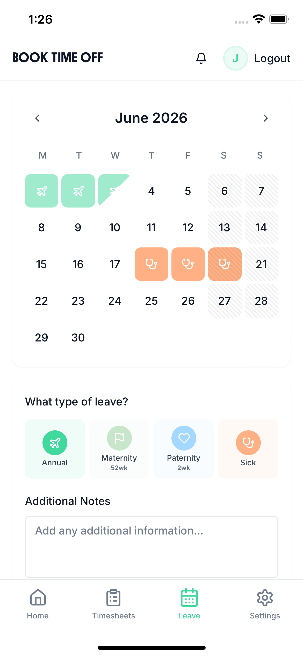 Factory worker booking holiday time off on mobile